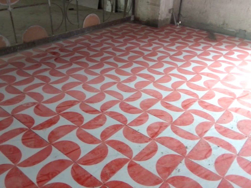 Floor laid in a red and white semicircle pattern